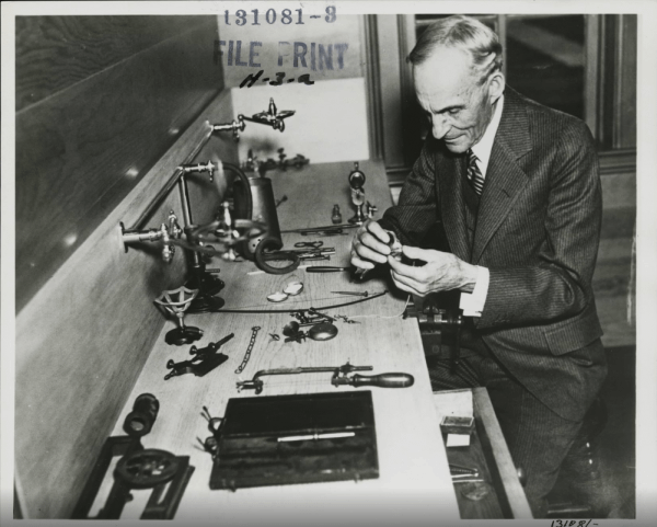 Henry Ford Examining a Watch at Magill Jewelry Store (now Cohen Millinery), Greenfield